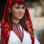 Macedonian Girl In Traditional Greek Costume Of Historical Macedonia