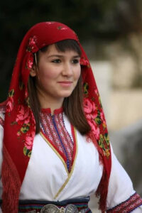 Macedonian Girl In Traditional Greek Costume Of Historical Macedonia